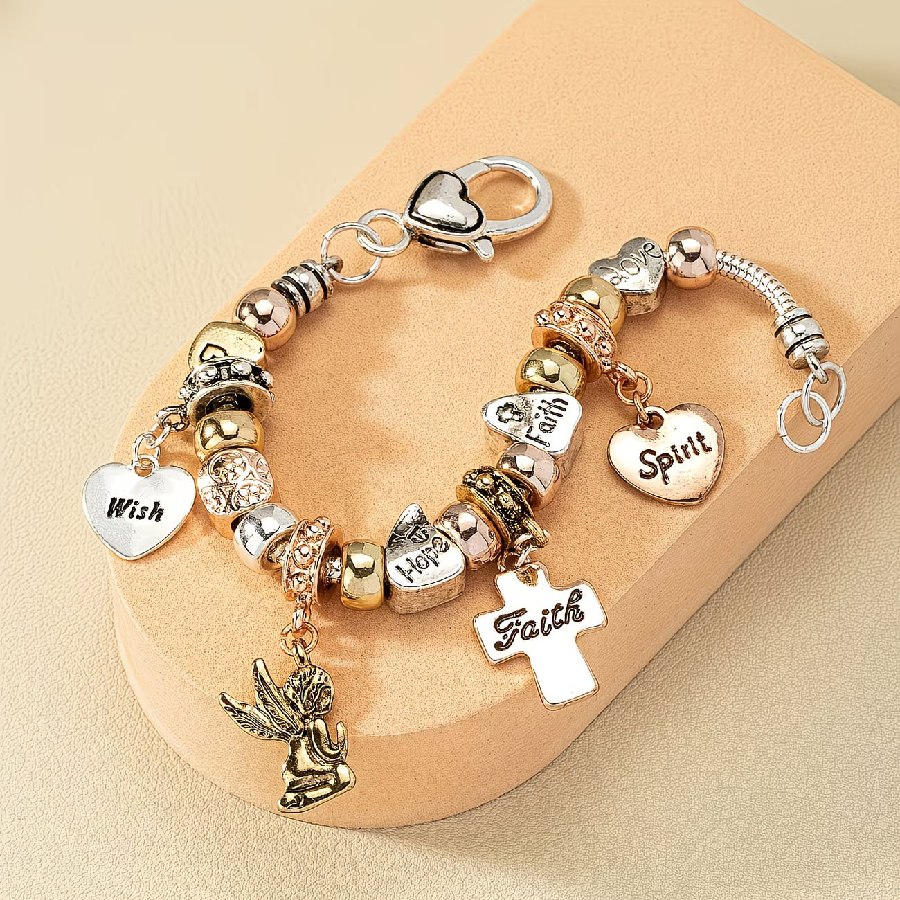 Vintage Vacation with Cross, Heart & Angel Charms Bracelet.