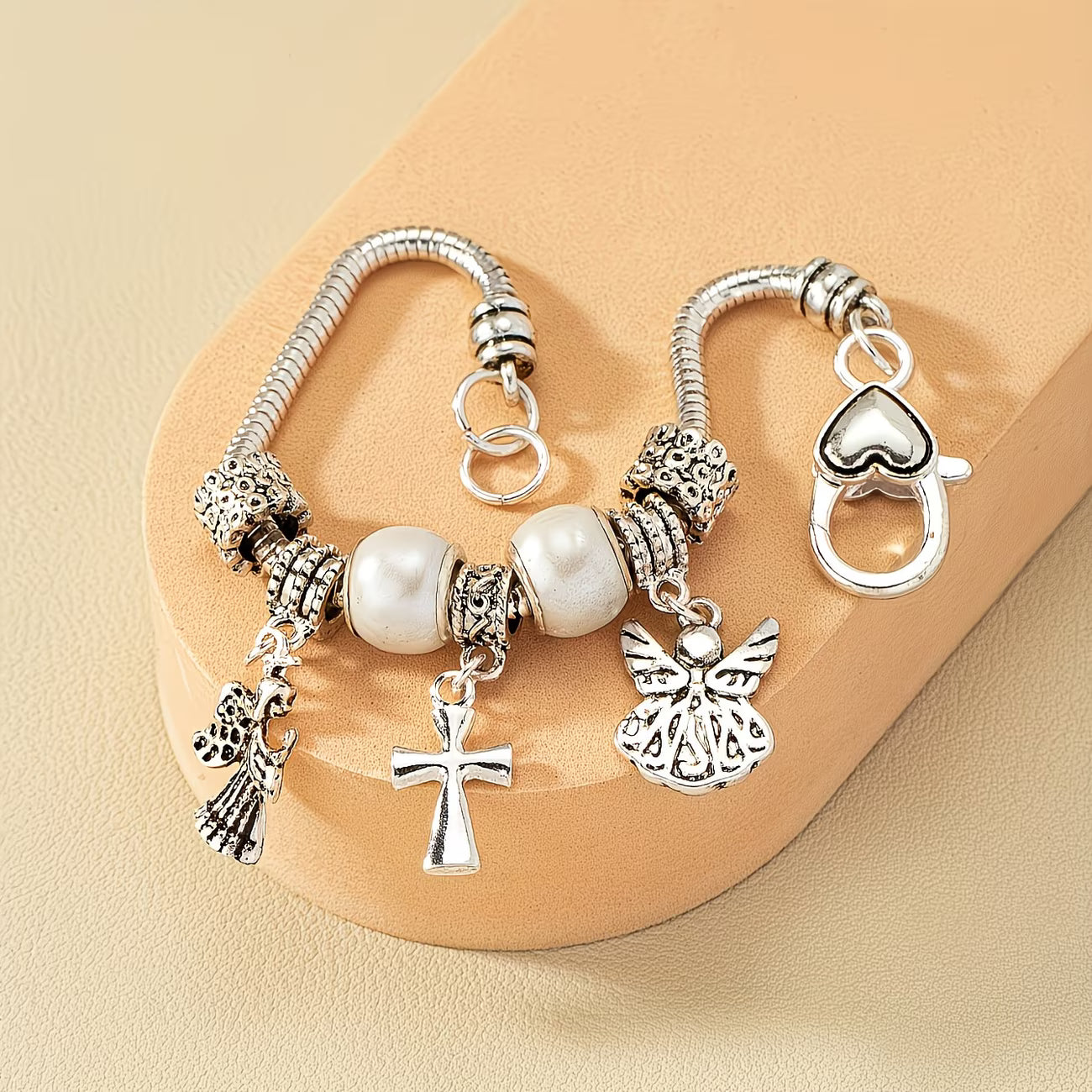 Vintage Vacation with Cross, Heart & Angel Charms Bracelet.