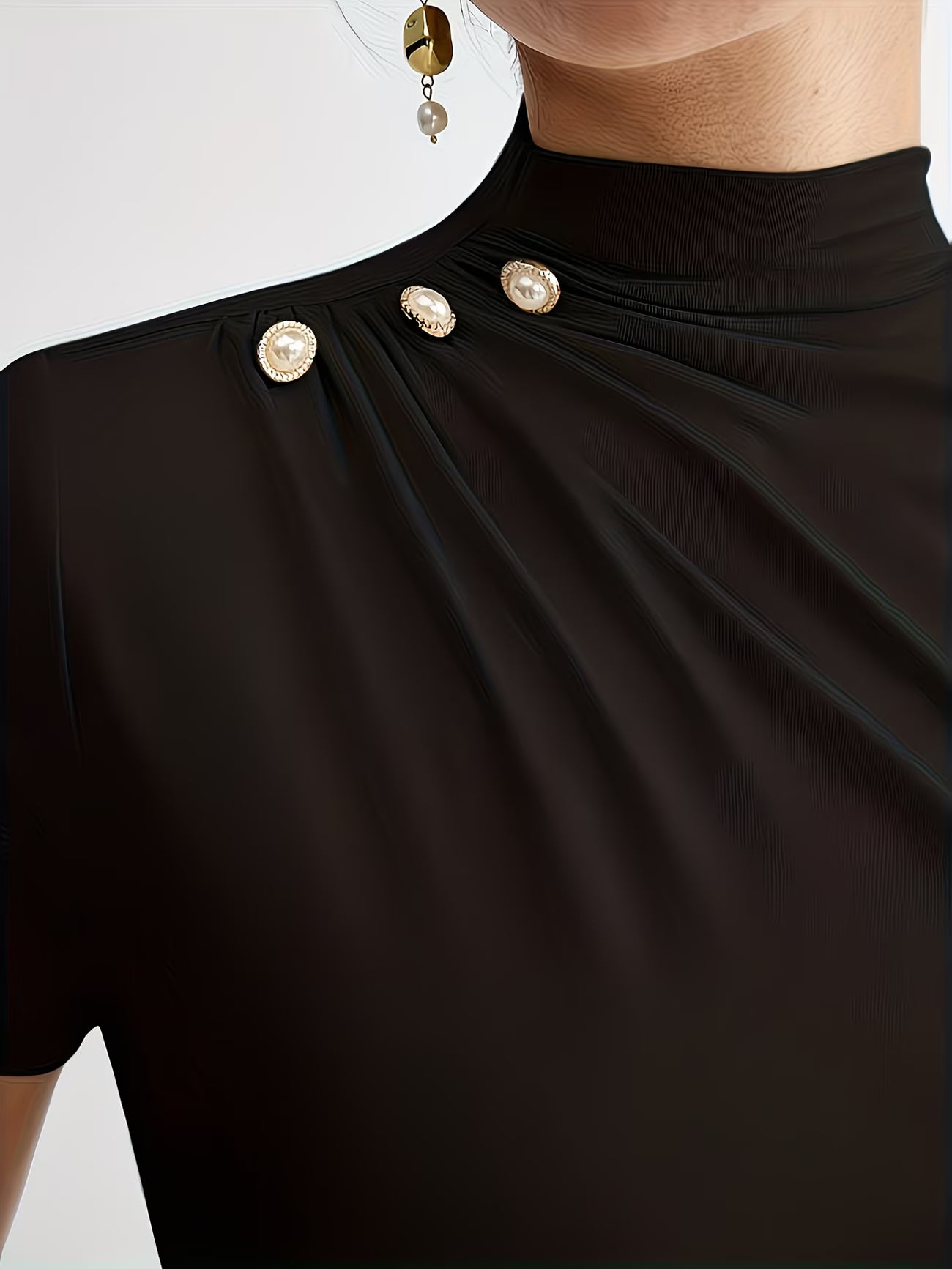 Women’s Elegant Button-Shoulder Tee.