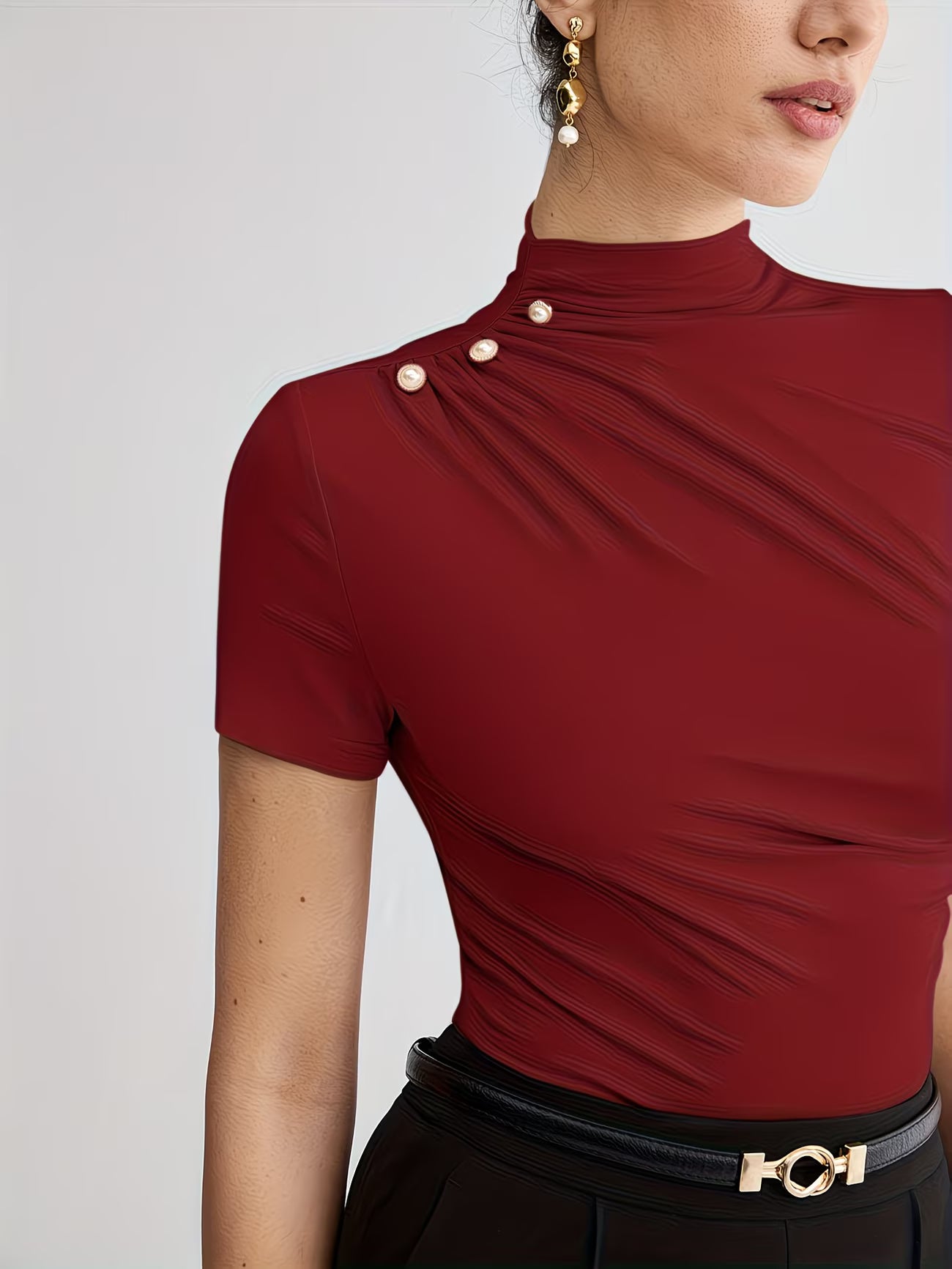 Women’s Elegant Button-Shoulder Tee.