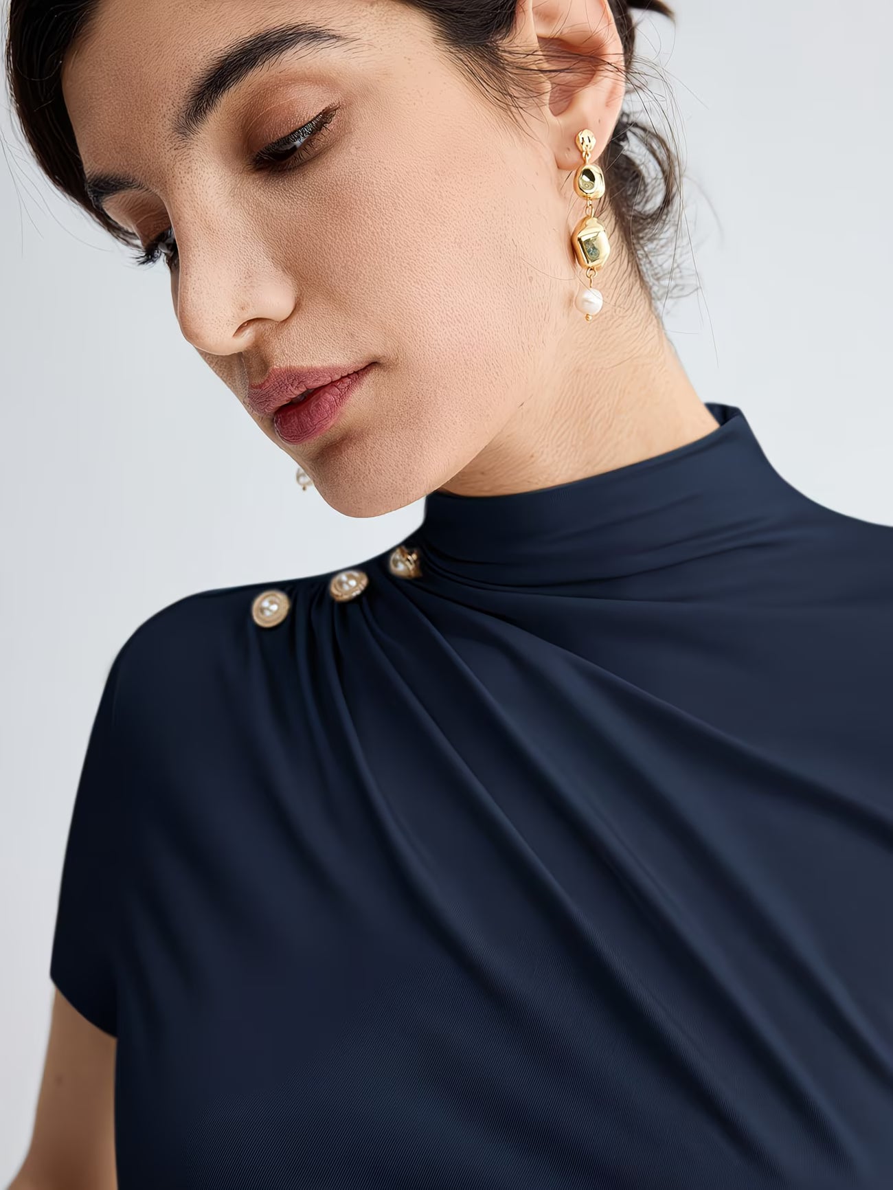 Women’s Elegant Button-Shoulder Tee.