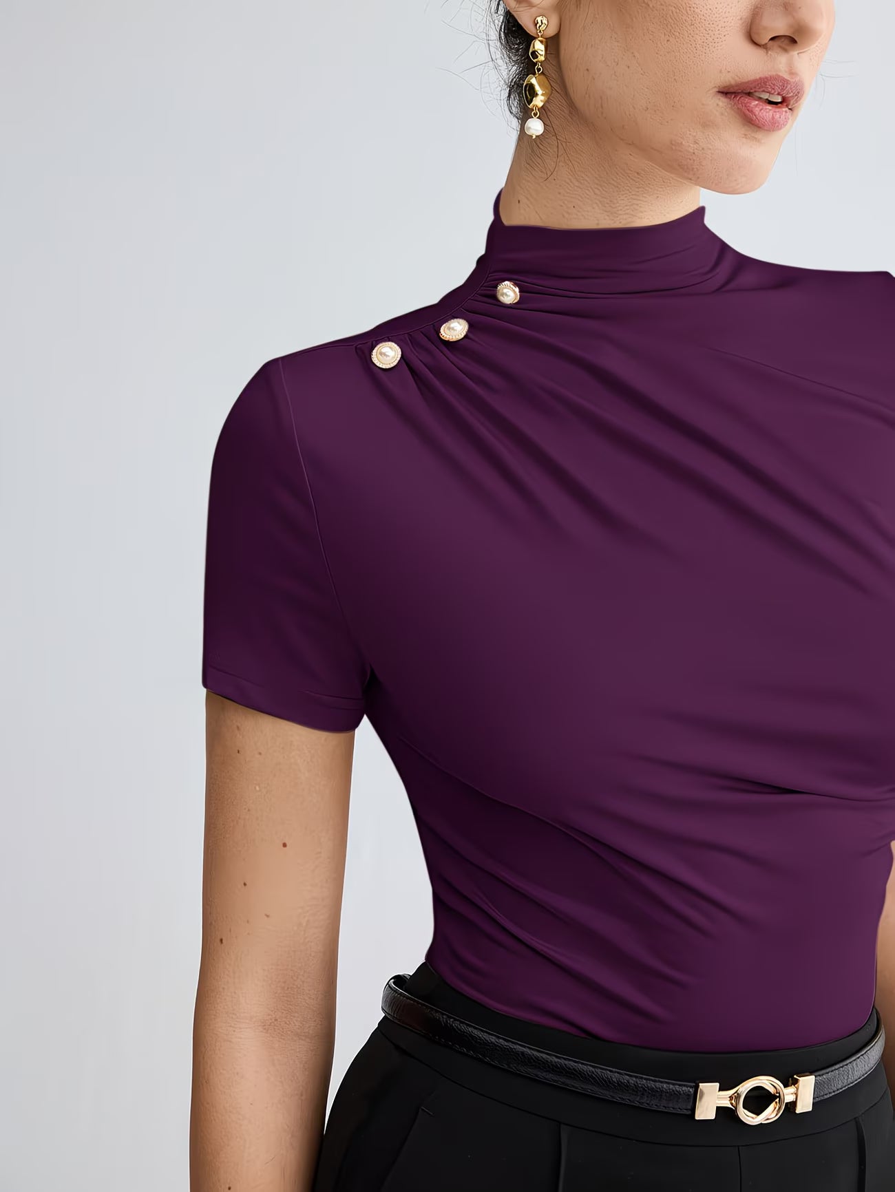 Women’s Elegant Button-Shoulder Tee.