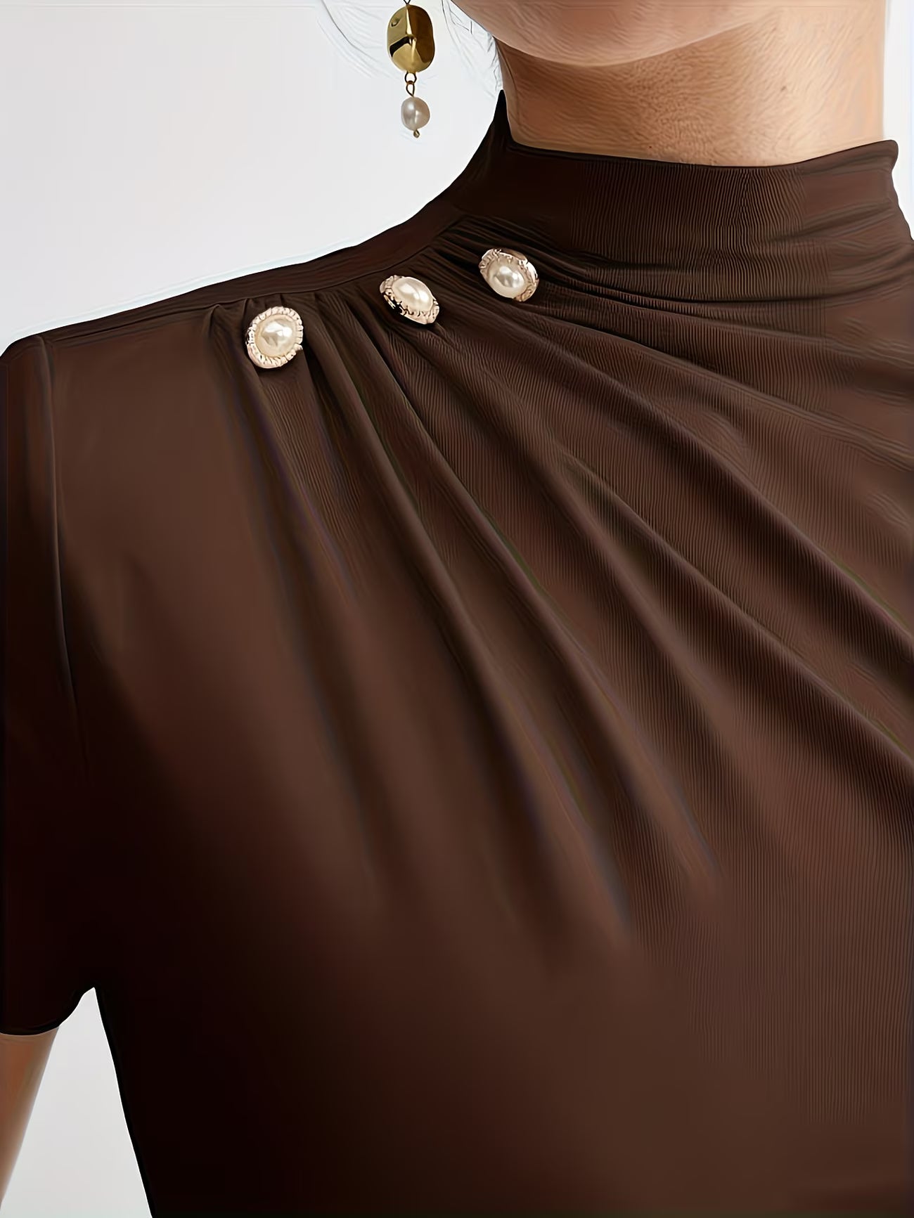 Women’s Elegant Button-Shoulder Tee.