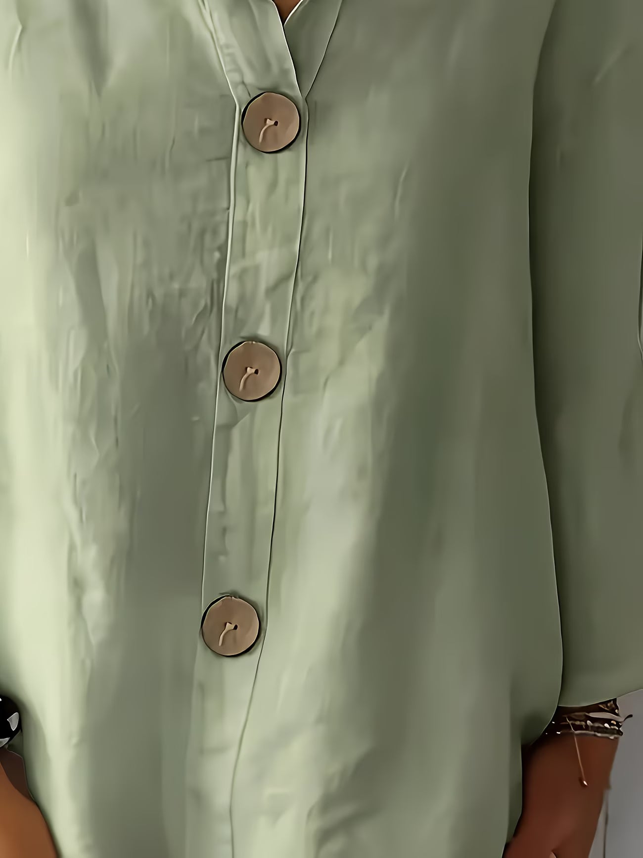 Women’s Elegant Button-Detail Vacation Shirt.