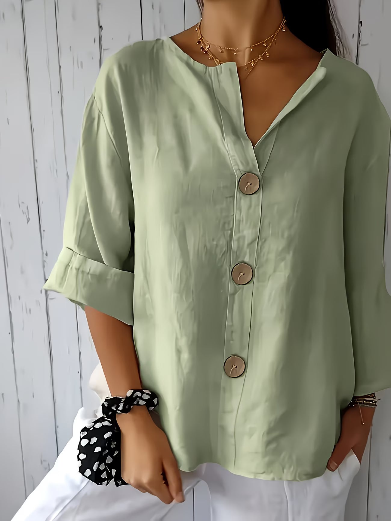 Women’s Elegant Button-Detail Vacation Shirt.
