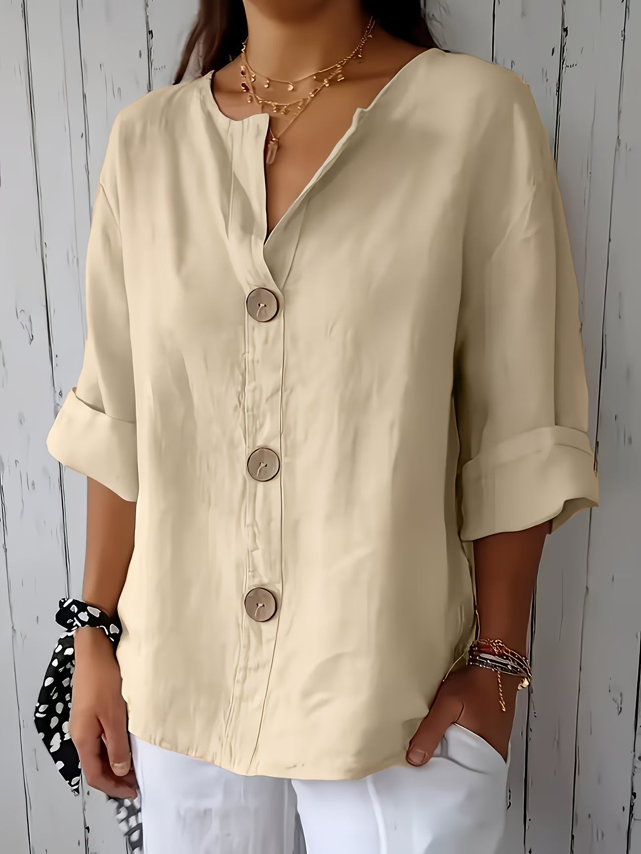 Women’s Elegant Button-Detail Vacation Shirt.