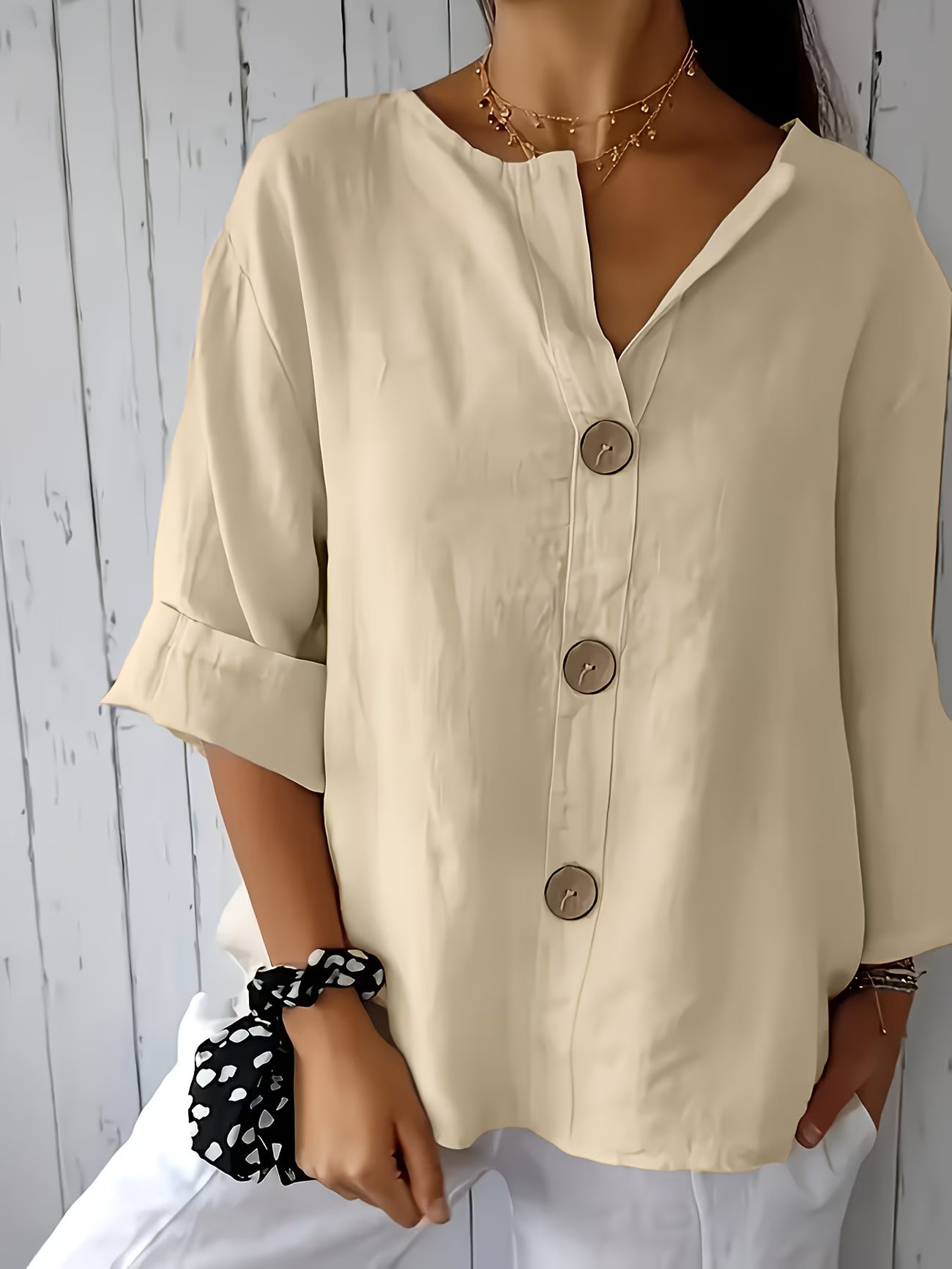 Women’s Elegant Button-Detail Vacation Shirt.